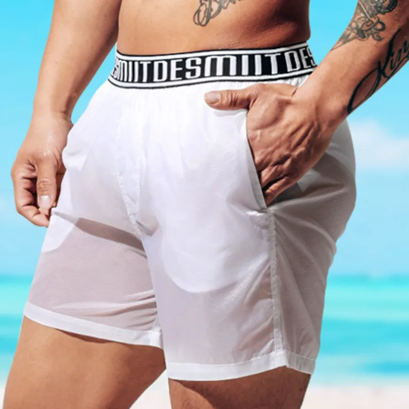 กางเกงว่ายน้ำขาสั้นผู้ชายแบบนุ - Trunks Board Surf บทวิจารณ์และราคา