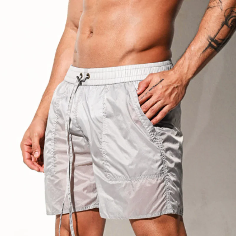 กางเกงว่ายน้ำขาสั้นสำหรับผู้ชา - Trunks Board Surf บทวิจารณ์และราคา